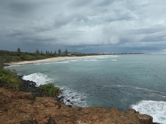 Family and friends hold a memorial for Dylan Carpenter at Fingal beach where the young surfer died. Fingal beach from the headland. Picture Glenn Hampson