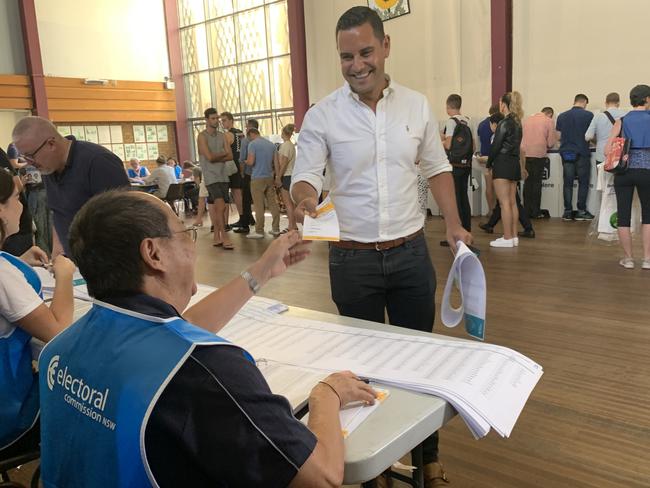 Alex Greenwich and City of Sydney Lord Mayor Clover Moore waiting in line to make their vote. Picture: Laura Sullivan