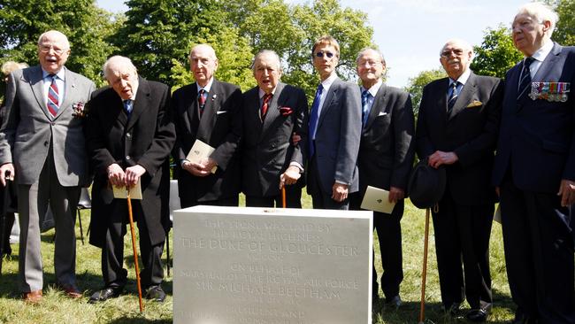 Robin Gibb (fifth left) joins RAF Bomber command Veterans (left to right) John L Cox, Gordon Mellor, Alf Hubrerman, Michael Beethham, Doug Radcille, Bill McFadden and Tony Iverson, at the ceremony for the laying of the foundation stone for the Bomber Command Memorial in Green Park, London. Picture: Getty