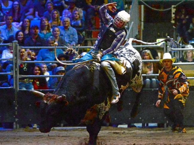 Aaron Kleier on Tenacious at the PBR bull riding event at the Great Western Hotel in Rockhampton. Chris Ison ROK210517crodeo1