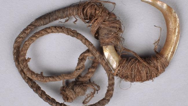 Fishhook Country: Coastal NSW, possibly Port Stephens area Made by ancestors; large turban shell (Ninella torquata), plant fibre twine Collected: 1830s, probably Lady Isabella Parry Entered the collection of The British Museum, London, 1926 Oc1926,0313.17 Dimensions: Shell hook 2.5 cm (W), 2.8 (H), 0.5 cm (D); hook with cord extended 22.5 cm