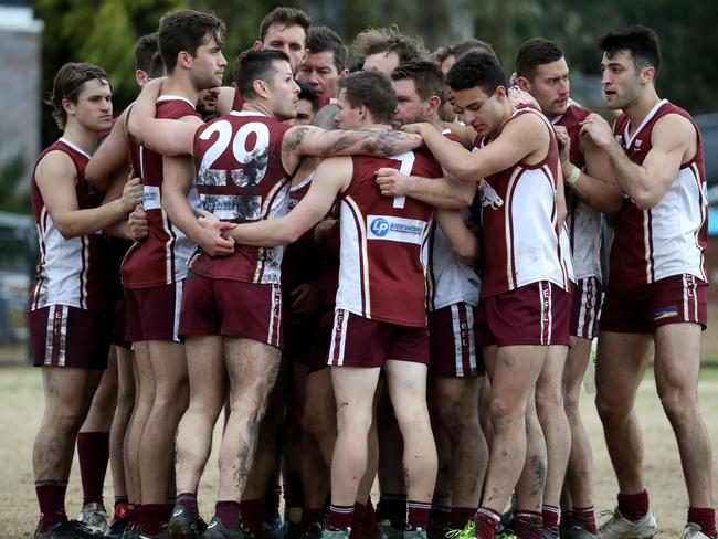 Whitehorse Pioneers in the huddle. Picture: Mark Dadswell/AAP