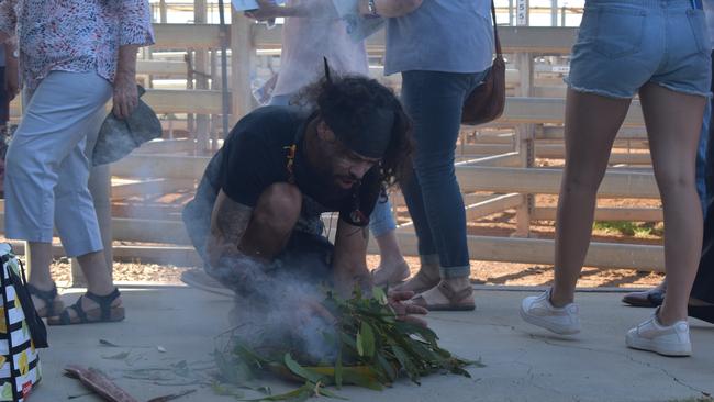 Mandandanji man Aaron Blades, who also goes by his Indigenous name Aaron Dhuril, opening the Maranoa Australia Day Awards 2023 with a traditional smoking ceremony. Picture: Chloe Cufflin.