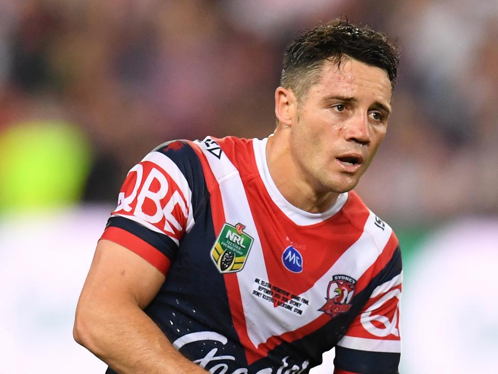 Cooper Cronk played with a broken scapula to guide the Roosters to victory in the 2018 grand final. Picture: AAP