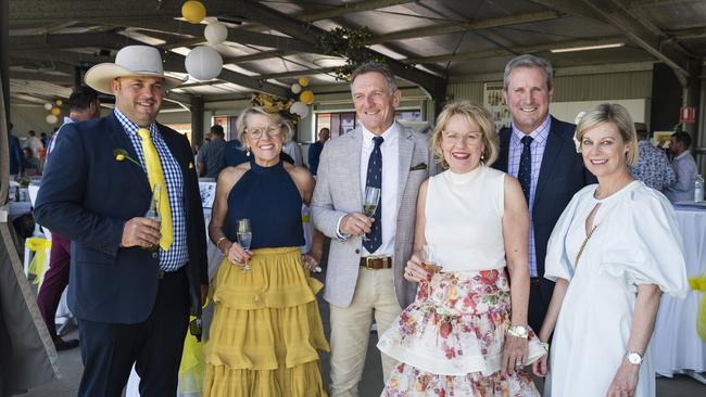 At Warwick Cup race day are (from left) Clint Parker, Paula Hatchman, Jim Wedge, Jackie Wedge, Mark Cook and Mary-Jane Cook at Allman Park Racecourse, Saturday, October 14, 2023. Picture: Kevin Farmer