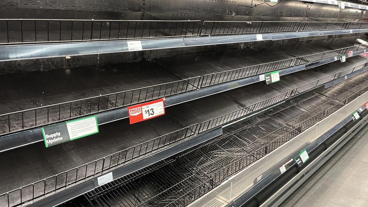 Bare shelves at a Woolworths CBD store on Sunday as product shortages worsen. Picture: Glenn Campbell