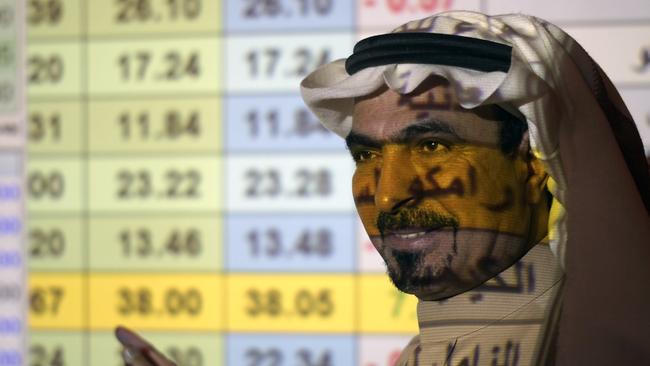 A Saudi trader watches Aramco’s progress. Picture: AP