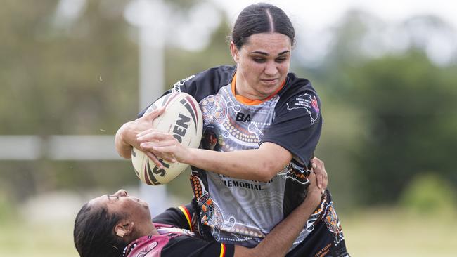 Toni McGrady for William Taylor Memorial is tackled by Cydnee Young of Toowoomba Warriors. Picture: Kevin Farmer