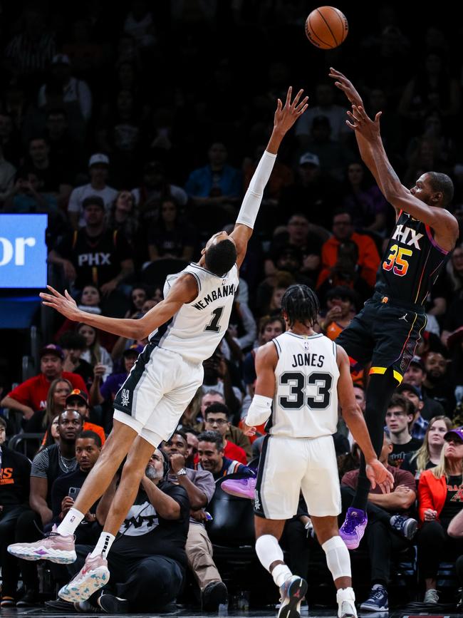 Durant had to work to get it over Wembanyama. Photo by Mike Christy/Getty Images