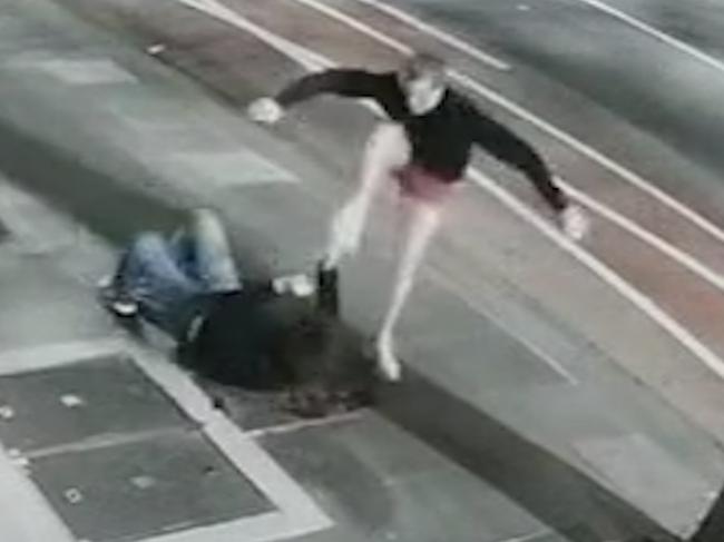 Shocking footage captures the moment father and son crime duo Jared Pihlgren, 53, and Jay Stephens, 23, launch a vicious assault on an innocent stranger on Lonsdale St, Melbourne, about 12.30am on December 17, 2021,