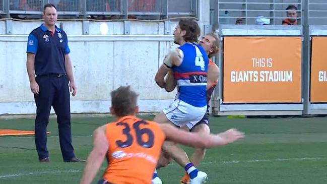 Marcus Bontempelli collects Giants defender Nick Haynes. Picture: Fox Footy