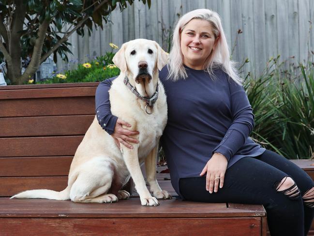 Jessica Hunter and her 10-year-old labrador Molly. Picture: Alan Barber