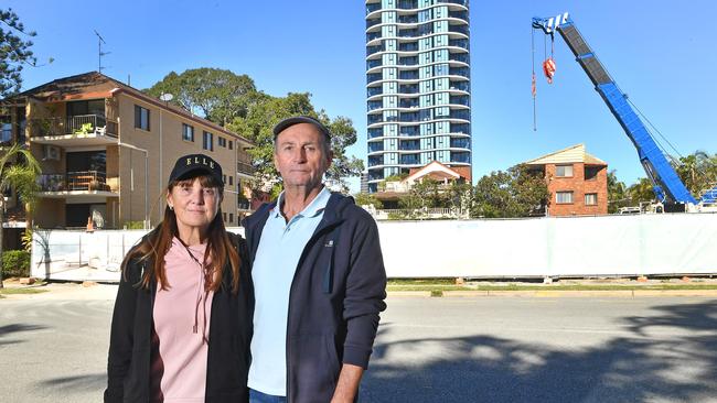 Residents of more than 30 years, Sue and Mark Jamieson, outside the empty Broadbeach site. Picture: John Gass