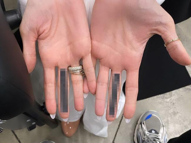 Angelina Jolie debuts her new middle finger tattoo. Picture: Mr.K/Instagram