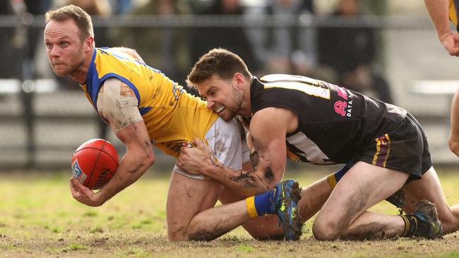 Craig Anderson winning the ball for Noble Park.