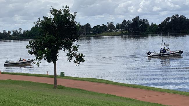 Police and Marine Rescue NSW boats searching the Manning River for the missing man.