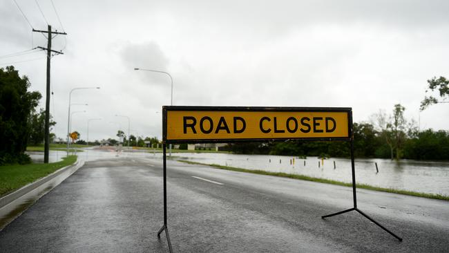 Flooding across Townsville. Lower Bridge closed on the Bohle River as overflow covers the road. Picture: Alix Sweeney
