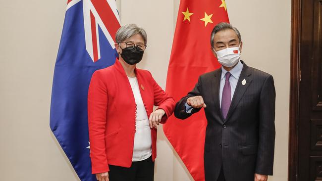 Penny Wong with China’s Foreign Minister, Wang Yi, in Bali. Picture: Johannes P. Christo