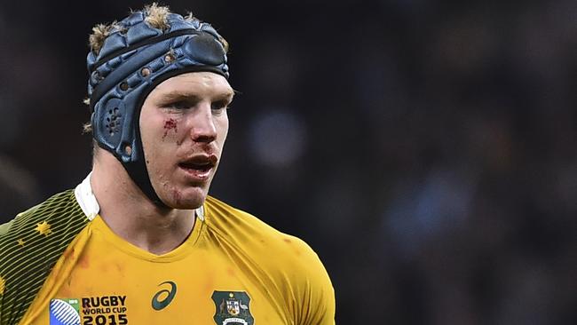 (FILES) A file photo taken on October 25, 2015 shows Australian Wallabies player David Pocock celebrating after winning their semi-final match of the 2015 Rugby World Cup against Argentina at Twickenham Stadium in London. Australian Rugby Union chief Bill Pulver said on February 11, 2016, he is open to star backrower David Pocock taking a sabbatical and is not ruling out any option that allows him to retain top players. The No. 8, who recovered from two knee reconstructions in two years to play a stunning role for Australia at the World Cup last year, is considering a one-year break from rugby to study in England. AFP PHOTO / FILES / GABRIEL BOUYS RESTRICTED TO EDITORIAL USE, NO USE IN LIVE MATCH TRACKING SERVICES, TO BE USED AS NON-SEQUENTIAL STILLS