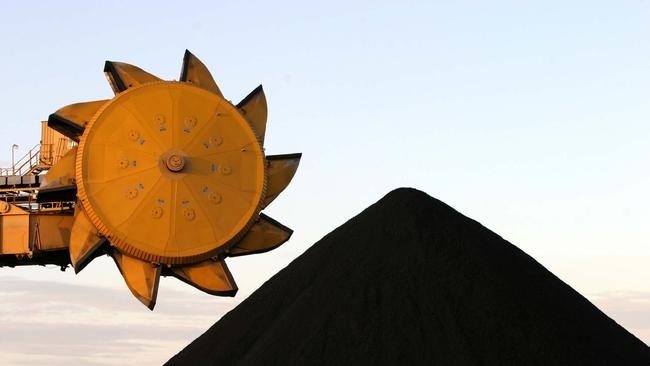 A bucketwheel coal reclaimer stands ready near a pile of coal at the Newcastle port in NSW Apr 01, 2004. picMichael/Caronna /Bloomberg /News exports industry mining machinery