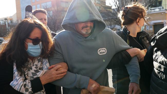 Ross Phillip Hicks outside the Adelaide watch house surrounded by his wife and supporters. Picture: NCA NewsWire / David Mariuz