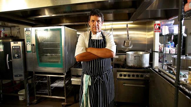 Fig Jam Catering owner Jason Davidson is taking Burleigh Brewing to court over its use of the Fig Jam trademark for one of its brews. Pics of Jason in his shop/kitchen with some of his products - his business has been operating since 2005. Picture: MARC ROBERTSON