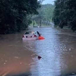 A vehicle stranded in floodwaters at Peachester on the Sunshine Coast hinterland. Picture: 7 News