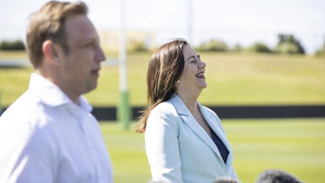 Premier Annastacia Palacsczuk laughs while Steven Miles talks at the announcement that the 2021 NRL Final series will be played in Queensland. Picture Lachie Millard