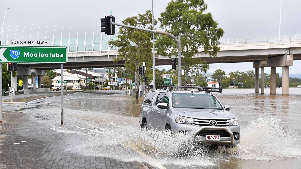 Bradman Ave remains closed as residents prepare for more rain and heavy flooding to hit the Sunshine Coast. Picture: Patrick Woods.