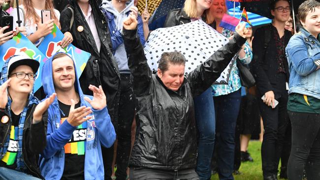 Supporters react with elation at the marriage equality rally in Hindmarsh Square, Adelaide. Picture: David Mariuz/AAP