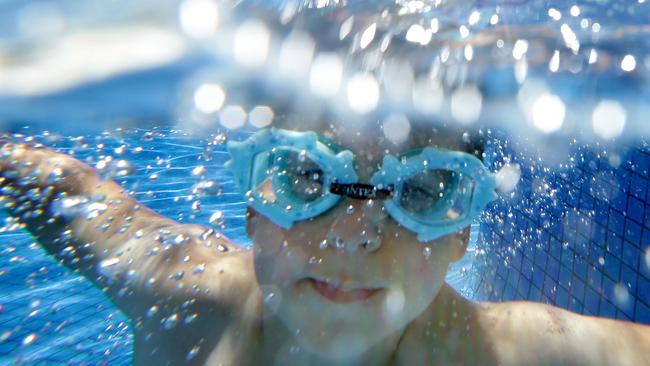 Henry Duigan, 4, cools off at his grandparents Gilberton home. Picture: Dylan Coker