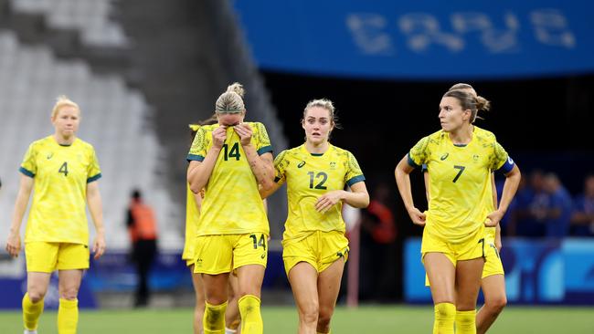 MARSEILLE, FRANCE - JULY 31: Alanna Kennedy #14 of Team Australia shows her dejection after losing the Women's group B match between Australia and United States during the Olympic Games Paris 2024 at Stade de Marseille on July 31, 2024 in Marseille, France. (Photo by Alex Livesey/Getty Images)