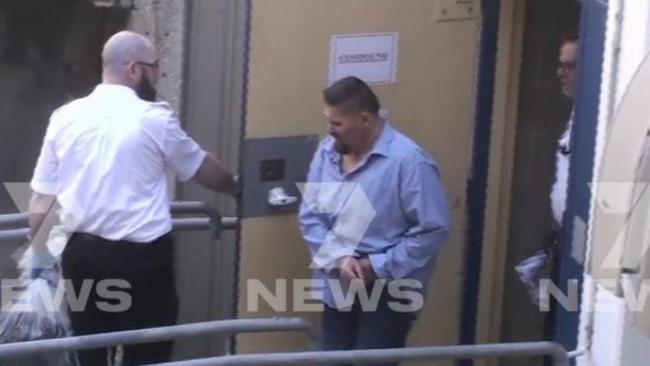 Mark Murphy being taken into Adelaide Magistrates Court, accused of murdering Geoffrey Mclean. Picture: 7NEWS