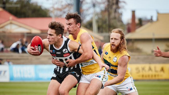 Boyd Woodcock (left) has been delisted after one season but Port Adelaide is committed to reclaiming him in the rookie draft. Picture: Matt Loxton