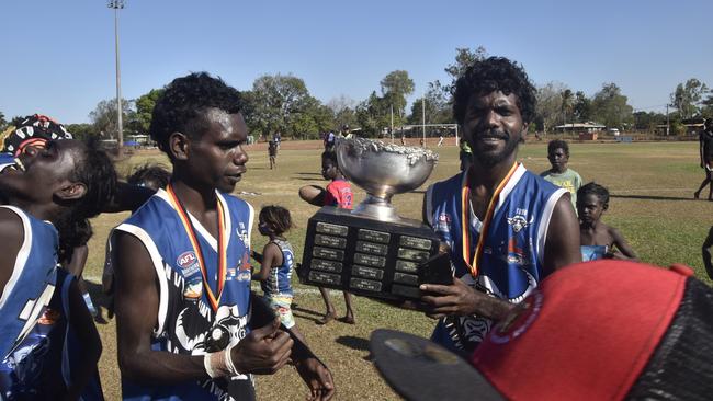 The Buffaloes following the win in the Tiwi Island Football League grand final between Tuyu Buffaloes and Pumarali Thunder. Picture: Max Hatzoglou