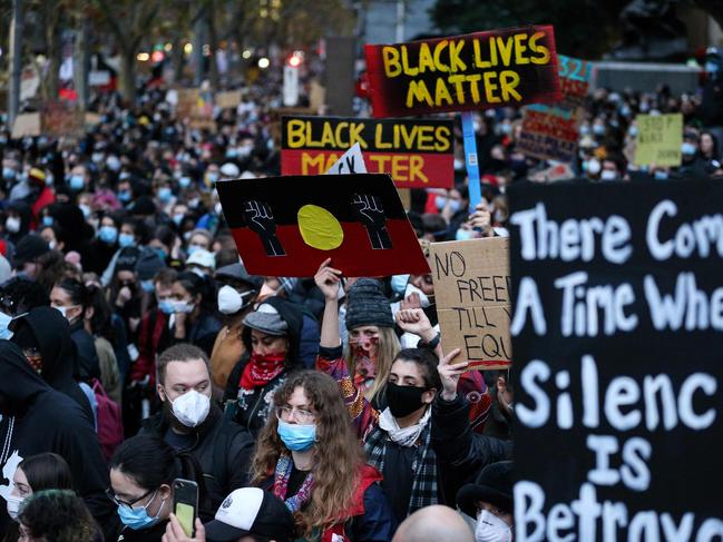 Melbourne demonstrators attend a Black Lives Matter protest to express solidarity with US protesters. Picture: Con Chronis / AFP