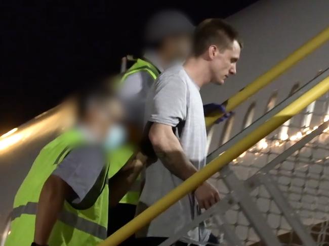 Convicted criminals board a chartered Australian Border Force (ABF) plane. Picture: ABF