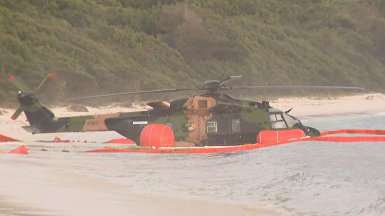 ADF chopper found in Jervis Bay Two defence personnel injured, counter