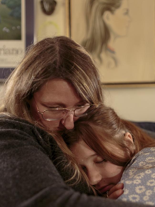 Birdie and her mother, Kait Handler, hug at their home in Long Island, New York. November 19, 2024. Picture: Sarah Blesener for WSJ