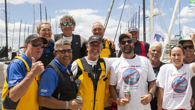 A crew celebrating their arrival in a previous race.