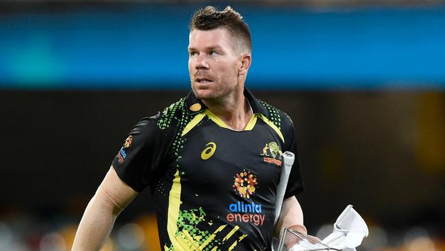 BRISBANE, AUSTRALIA - OCTOBER 07: David Warner of Australia looks dejected after being dismissed during game two of the T20 International Series between Australia and the West Indies at The Gabba on October 07, 2022 in Brisbane, Australia. (Photo by Matt Roberts/Getty Images)