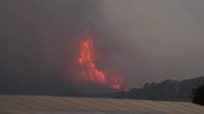 Fire burns around the Snowy Mountains town of Batlow today. Picture Rohan Kelly