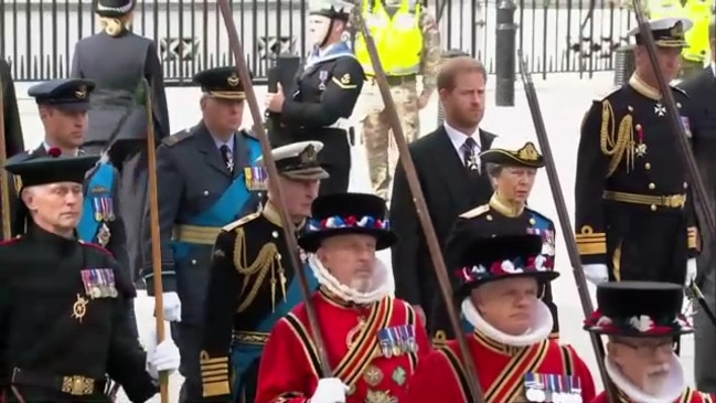 King Charles, Prince William, Harry, and Andrew in procession behind the Queen's coffin