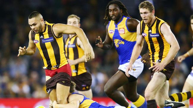 Former Power player turned Hawk Jarman Impey gets tackled against the West Coast Eagles last weekend. Michael Dodge/Getty Images)