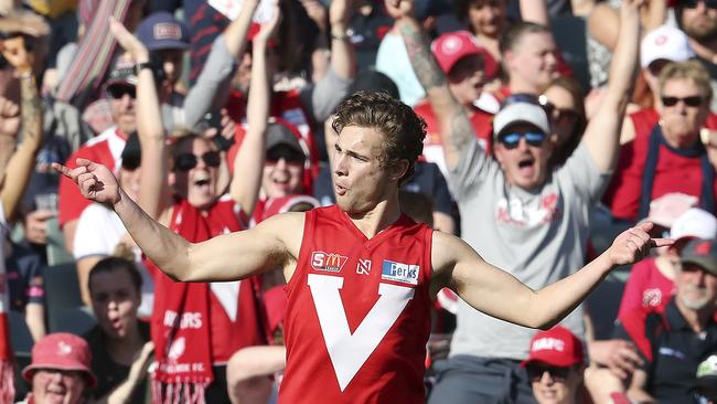 Boyd Woodcock celebrates his goal. He is among the young Roosters likely to be picked in the AFL draft. Picture Sarah Reed