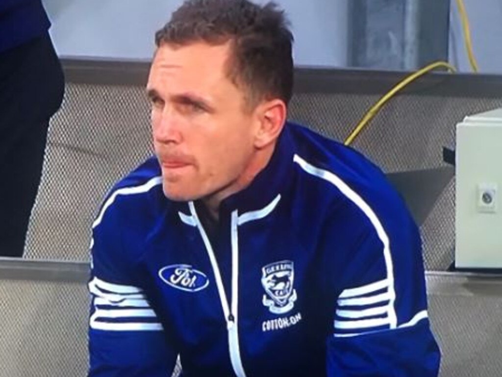 An injured Joel Selwood on the bench after hurting his hamstring against the Pies.