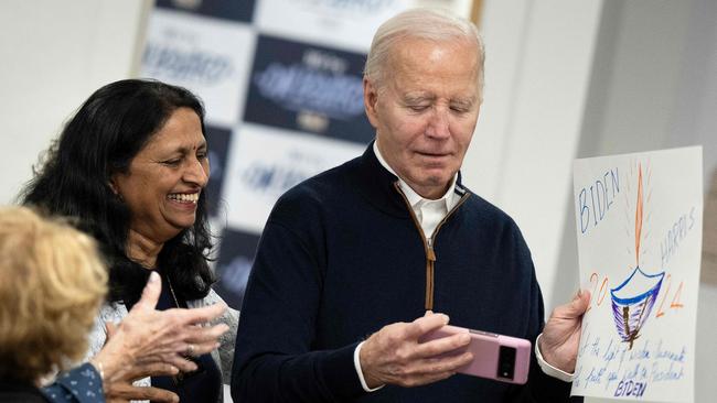 Joe Biden greets supporters during a campaign field office opening in Manchester, New Hampshire this week. Picture: AFP