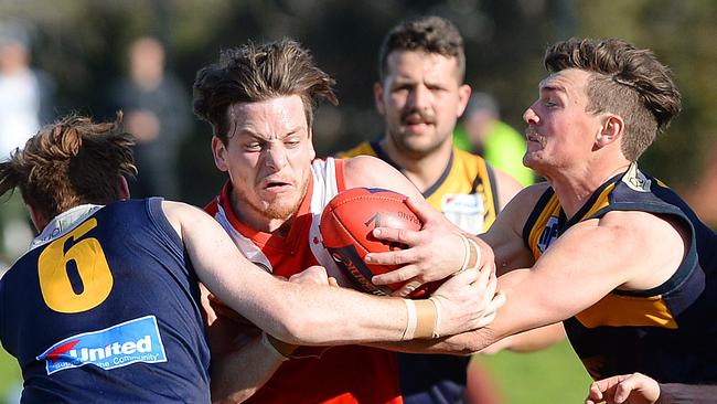 Ben Curtiss tries to break through a tackle during last year’s grand final. Picture: Josie Hayden.