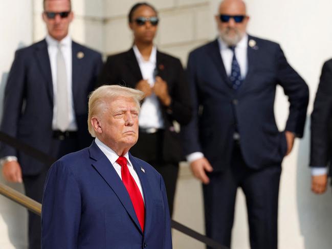 Former US president Donald Trump looks on during a wreath laying ceremony at the Tomb of the Unknown Soldier at Arlington National Cemetery. Picture: Getty Images via AFP