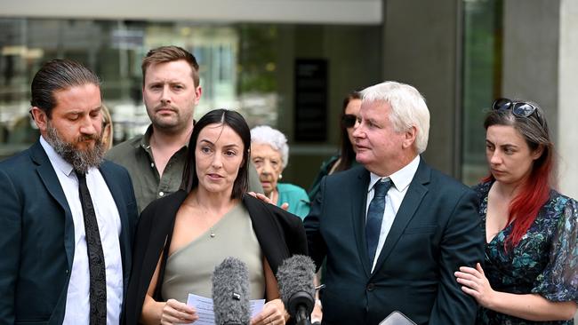 Kelly's sister Danielle Carroll with husband Reece (left) and Kelly's dad Reg following the Supreme Court sentencing. Picture: NCA NewsWire / John Gass